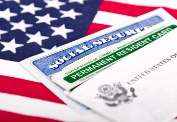 immigration documents with american flag
