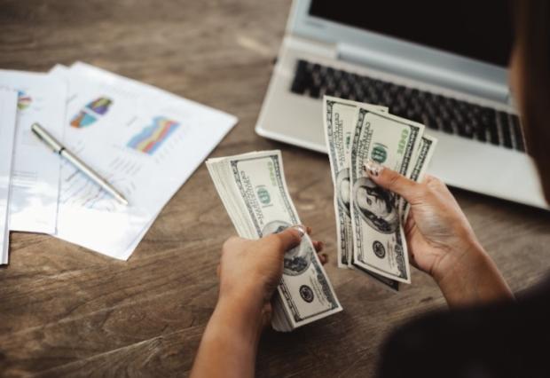 woman calculating taxes