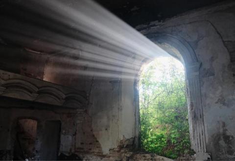 Sunlight shining into an old abandoned building